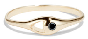 This ring showcases a black diamond set next to an open space.