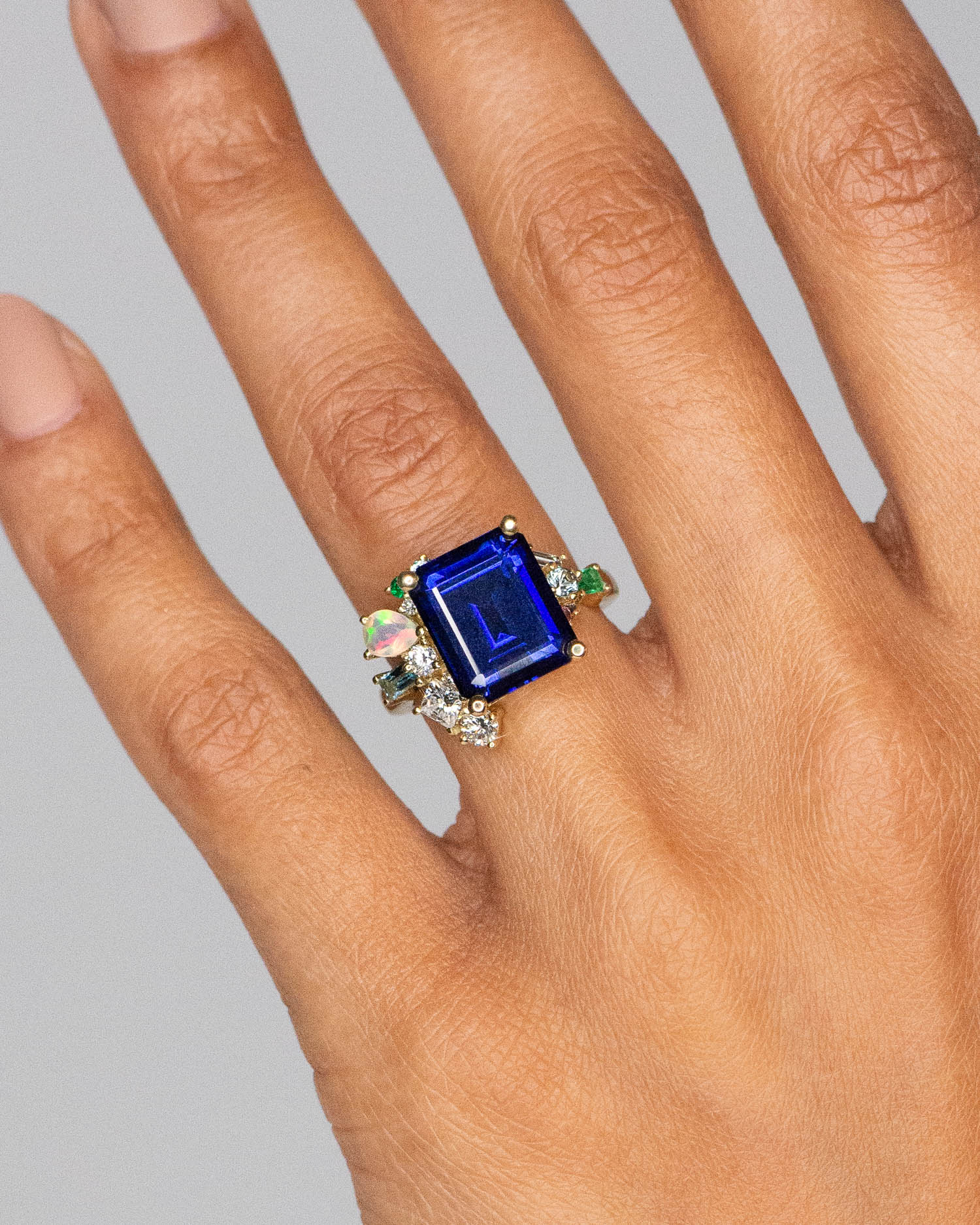 cust_sapphire_cluster_ring_claire_and_jay_lee_14y_web2.jpg