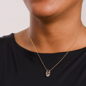 Trillion Dyad Topaz and Spinel Pendant in Yellow Gold on Figure